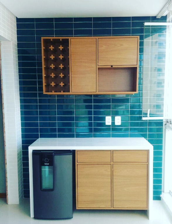 Varanda gourmet com armários planejados — projeto Castro